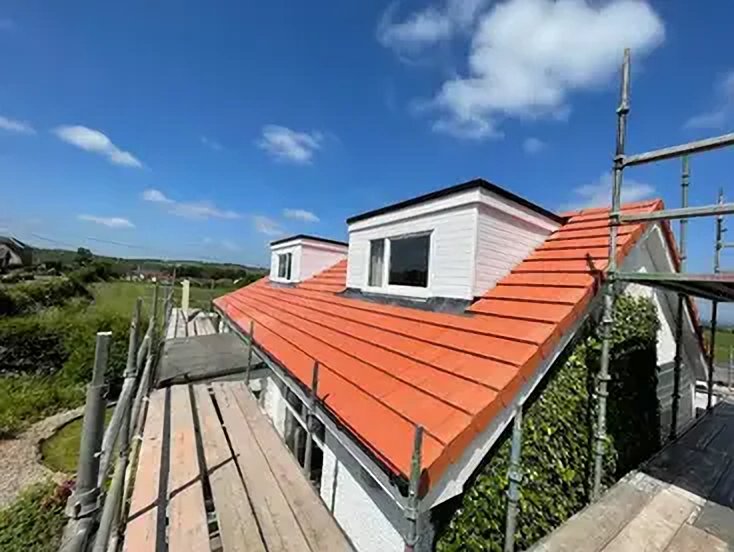 Recent roofing replacement work completed in Motherwell showing professional slate roof installation